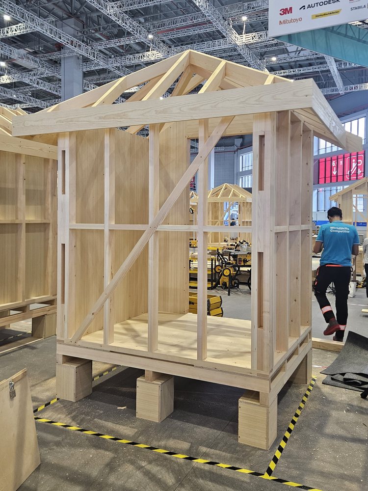 The timber house assembled in the competition area