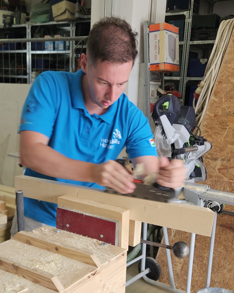 Planing a piece of wood in the workshop with a RALI hand plane